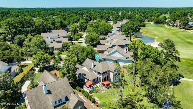 bird's eye view featuring a residential view, view of golf course, and a water view