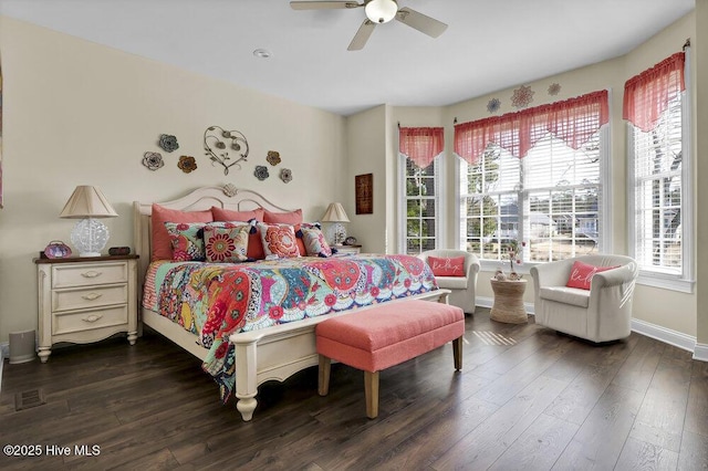 bedroom featuring ceiling fan and dark hardwood / wood-style flooring