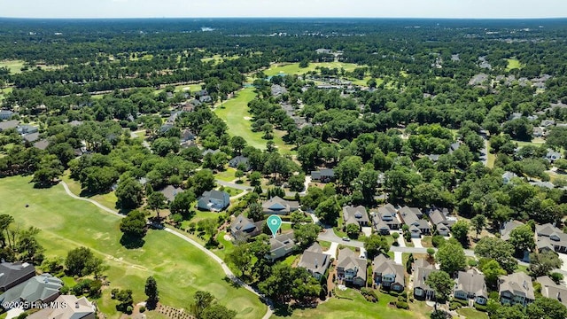 drone / aerial view with a residential view and golf course view