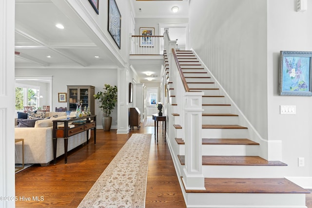 entryway with stairway, beamed ceiling, recessed lighting, coffered ceiling, and dark wood-style flooring