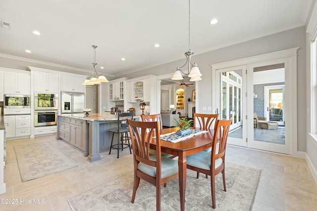 dining room featuring visible vents, recessed lighting, crown molding, and an inviting chandelier