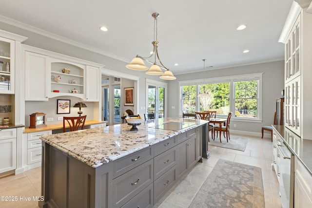 kitchen with ornamental molding, gray cabinets, a center island, white cabinets, and black electric stovetop