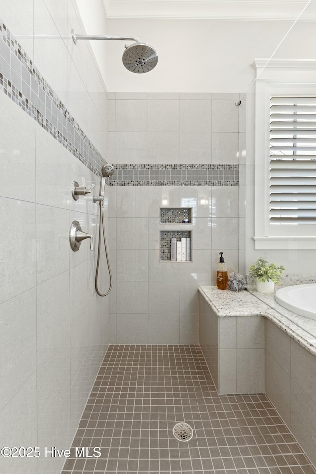 full bathroom with a tile shower