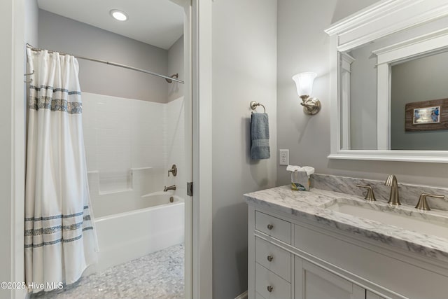 full bath with vanity and shower / bathtub combination with curtain