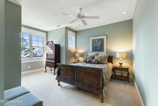 carpeted bedroom featuring visible vents, recessed lighting, baseboards, and ceiling fan