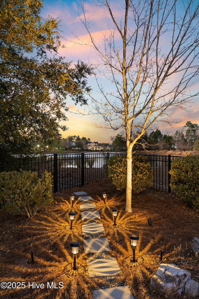 exterior space featuring a gate and fence