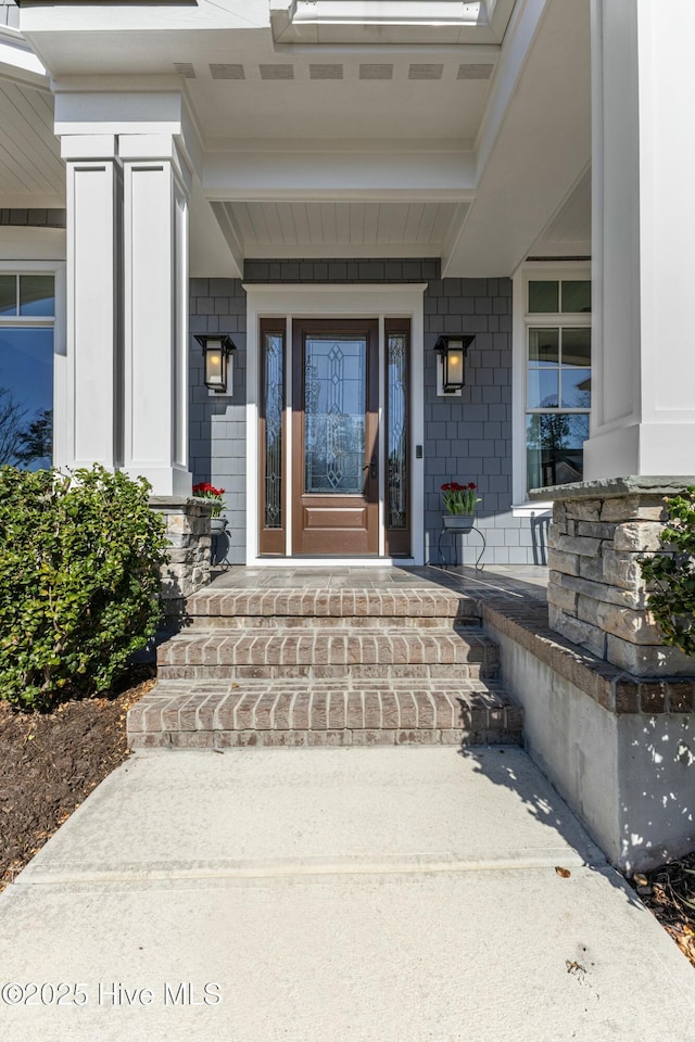 entrance to property with a porch