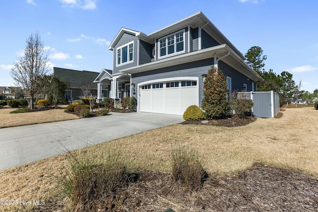 view of front of property with a garage and driveway