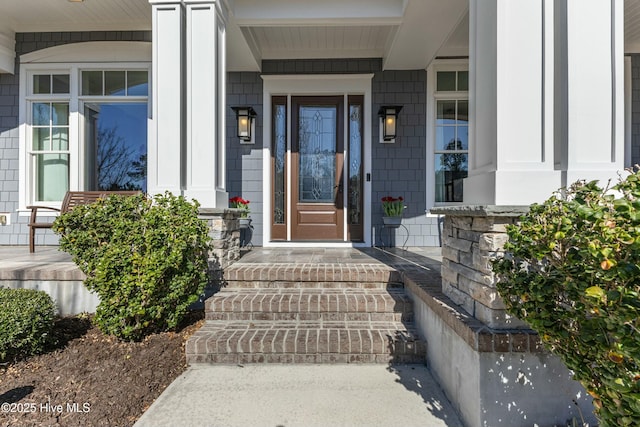 entrance to property with a porch