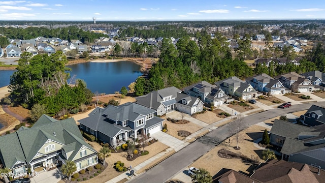 aerial view featuring a residential view and a water view