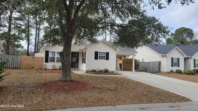 ranch-style house with a carport