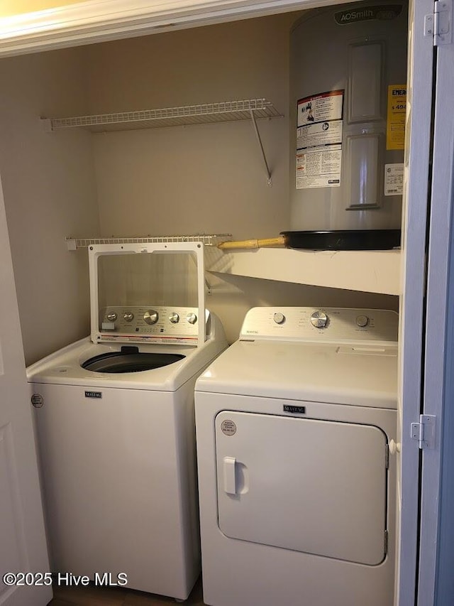 laundry room featuring washing machine and dryer