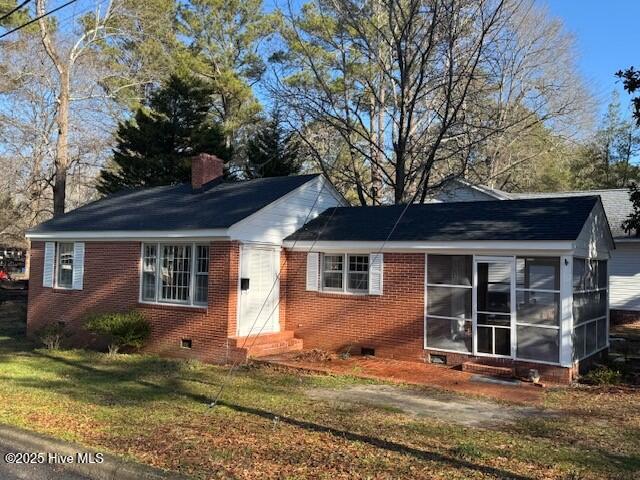 view of front of home with a front yard