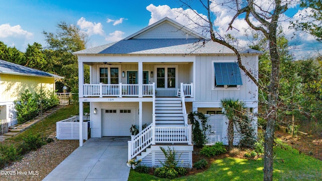 view of front of home featuring a garage and covered porch