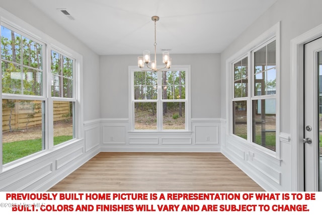 11 Pine Shore Dr, Southport, NC 28461 - unfurnished sunroom with a chandelier