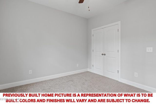 11 Pine Shore Dr, Southport, NC 28461 - unfurnished bedroom featuring carpet floors, a closet, baseboards, and ceiling fan