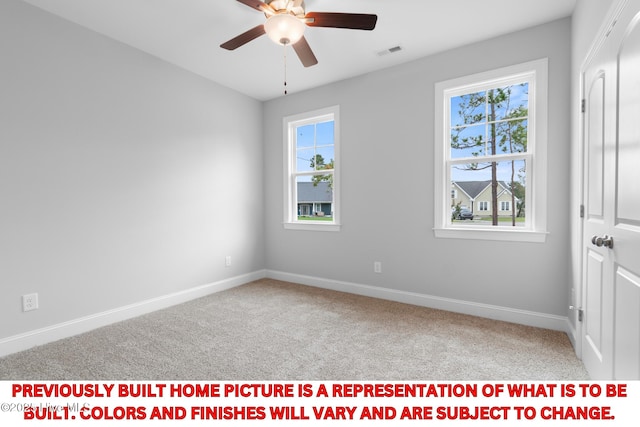 11 Pine Shore Dr, Southport, NC 28461 - carpeted spare room featuring a ceiling fan and baseboards