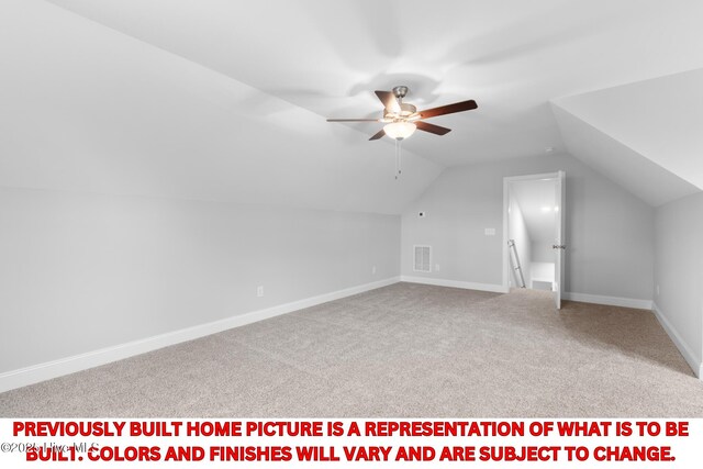 11 Pine Shore Dr, Southport, NC 28461 - bonus room featuring lofted ceiling, ceiling fan, carpet, and baseboards
