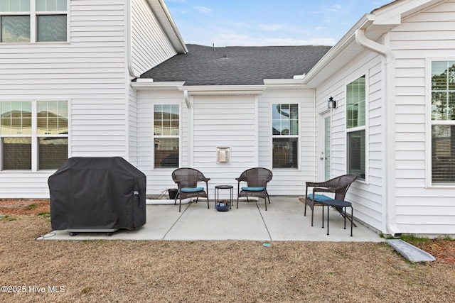 view of patio featuring a grill