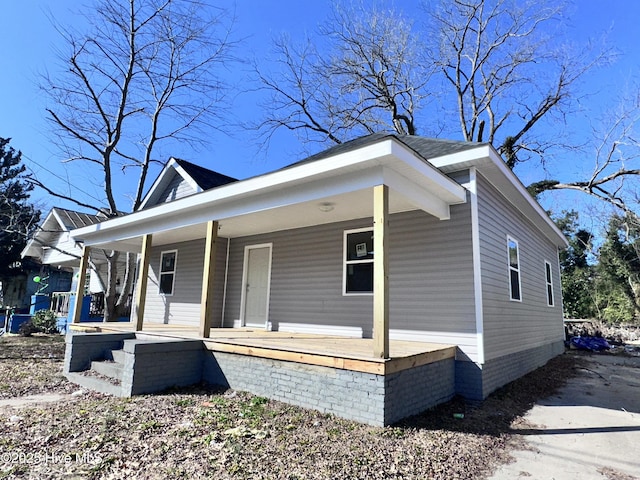 bungalow featuring covered porch