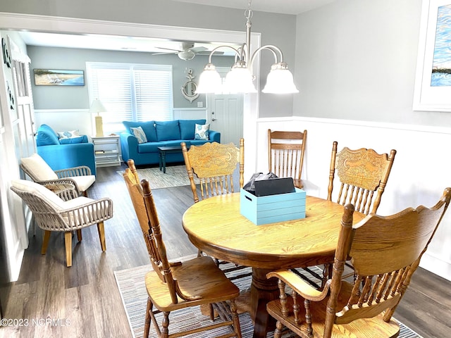 dining space featuring wood-type flooring