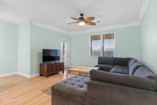 living room featuring crown molding, ceiling fan, and hardwood / wood-style floors