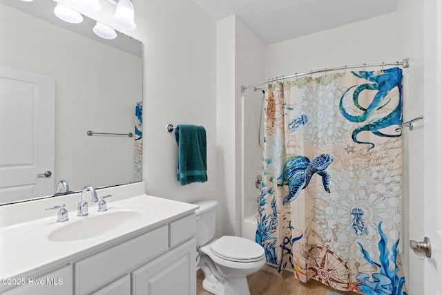 full bathroom with vanity, wood-type flooring, shower / tub combo with curtain, and toilet