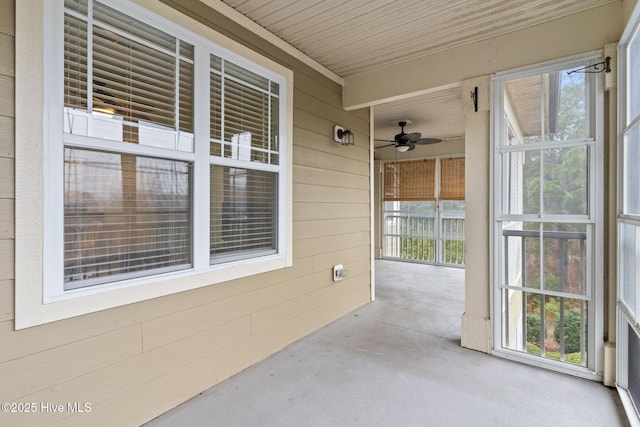 unfurnished sunroom featuring plenty of natural light