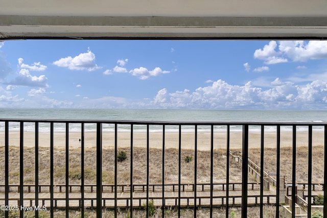 view of water feature with a beach view