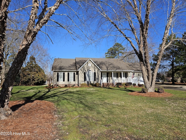 view of front of house with a porch and a front yard