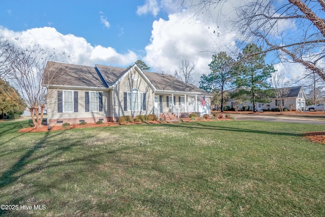 view of front facade featuring covered porch and a front yard