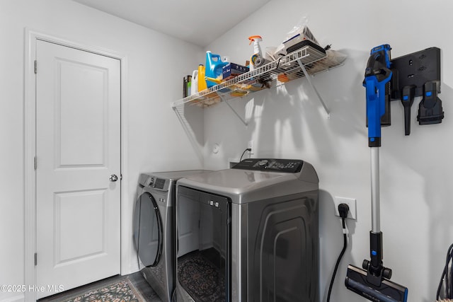 clothes washing area featuring washing machine and dryer