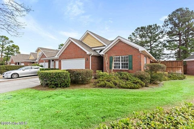 view of front of house with brick siding and an attached garage