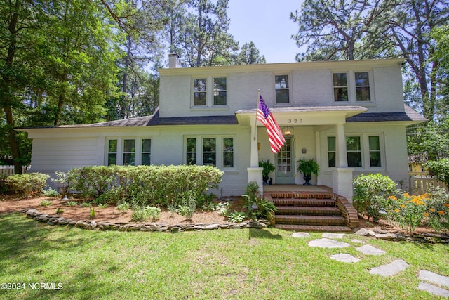 view of front of property with a front yard