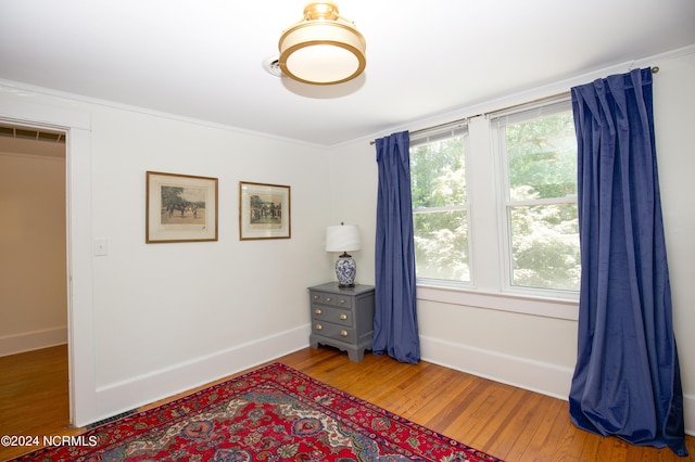 interior space with hardwood / wood-style floors