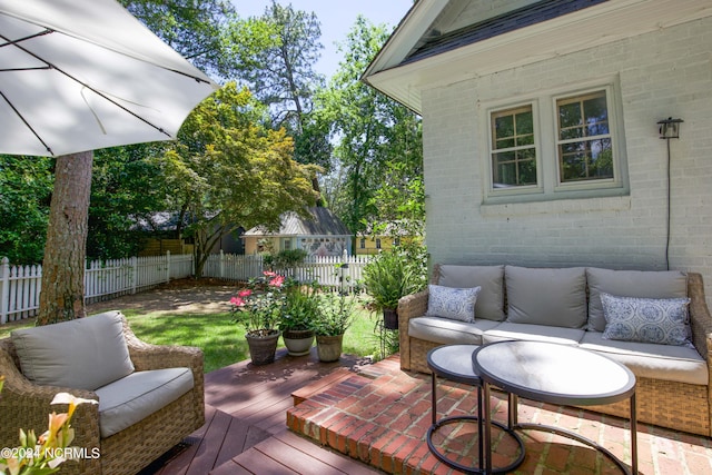 deck with outdoor lounge area