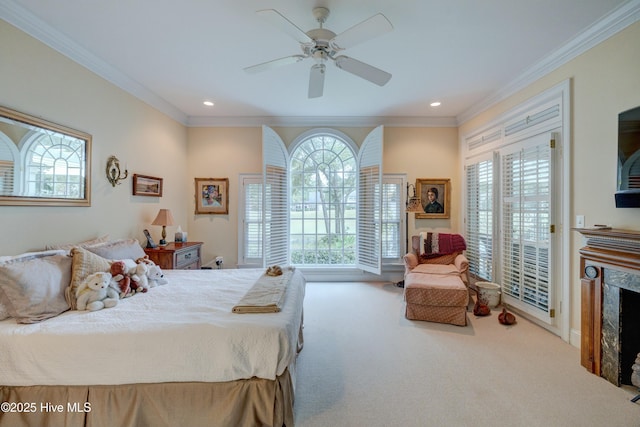 bedroom with multiple windows, crown molding, carpet, and a high end fireplace