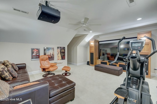 exercise room featuring vaulted ceiling, crown molding, light colored carpet, and ceiling fan