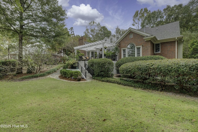 view of front of property with a pergola and a front yard