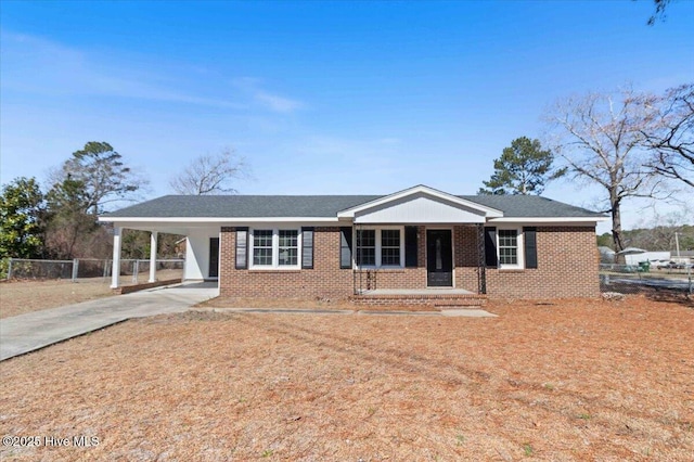 ranch-style home with a carport