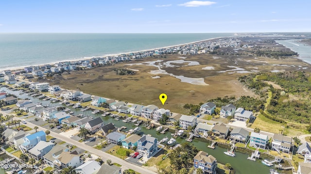 bird's eye view with a water view and a residential view