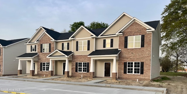 703 Henry Ln, Tarboro, NC 27886 - view of front of home featuring brick siding and board and batten siding