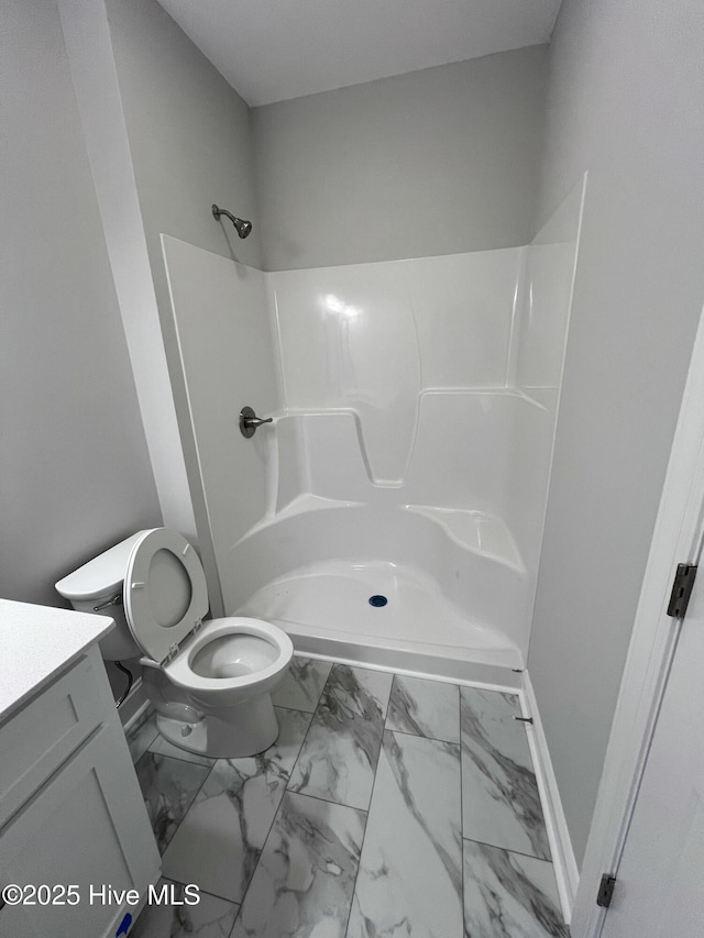 703 Henry Ln, Tarboro, NC 27886 - bathroom with walk in shower, toilet, marble finish floor, and vanity