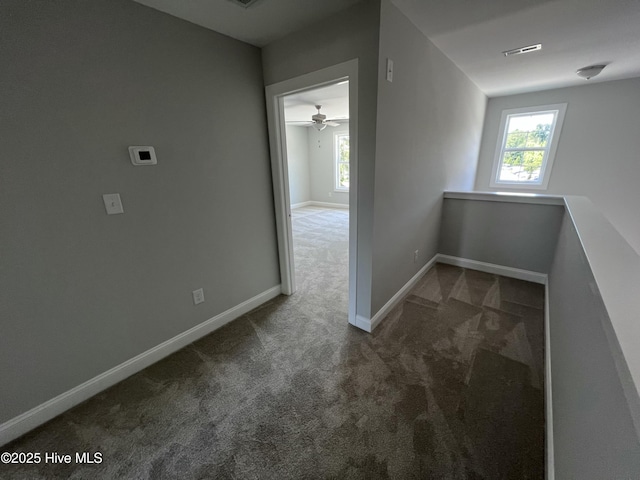 703 Henry Ln, Tarboro, NC 27886 - hall with visible vents, baseboards, and carpet floors