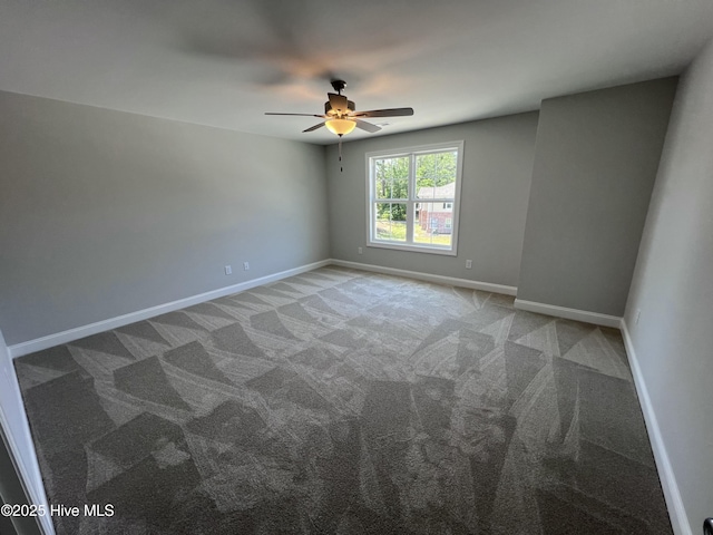 703 Henry Ln, Tarboro, NC 27886 - unfurnished room featuring a ceiling fan, baseboards, and carpet