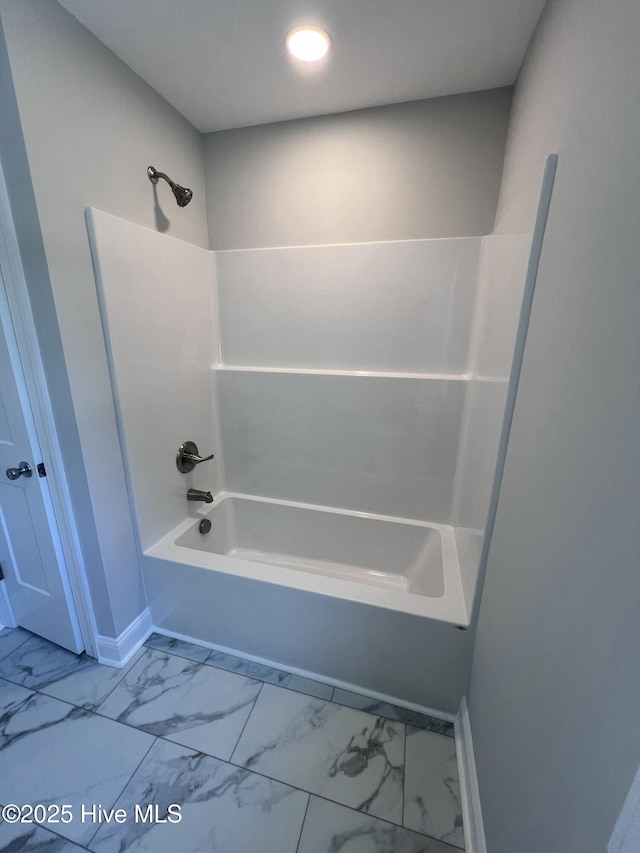 703 Henry Ln, Tarboro, NC 27886 - full bathroom with shower / bathtub combination, baseboards, marble finish floor, and recessed lighting