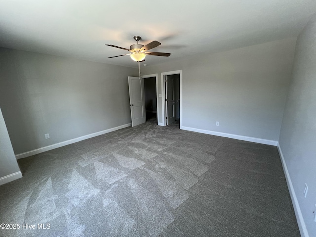 703 Henry Ln, Tarboro, NC 27886 - unfurnished bedroom featuring baseboards, a ceiling fan, and carpet floors
