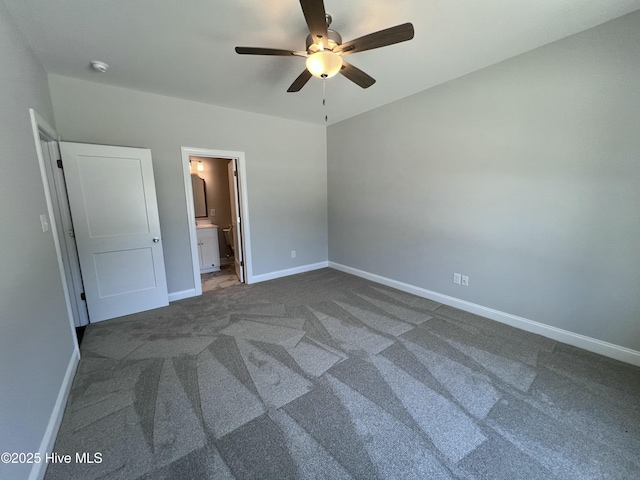 703 Henry Ln, Tarboro, NC 27886 - unfurnished bedroom featuring ensuite bath, ceiling fan, carpet flooring, and baseboards