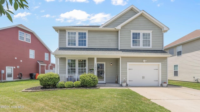 front of property featuring a garage, a front yard, and covered porch