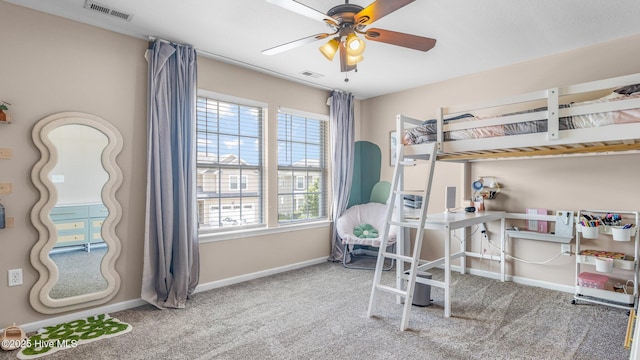 bedroom featuring ceiling fan and carpet flooring